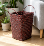 Double-handled straw woven coffee-colored basket, fruit and towel storage